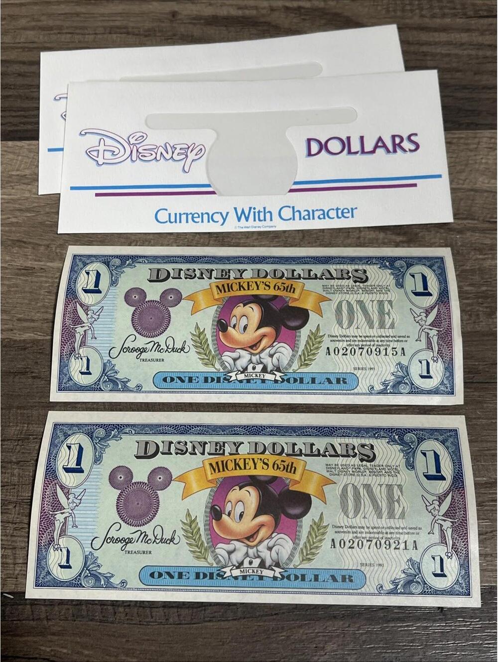 Disney Dollars (2) $1 Mickey 65th Anniversary Bills With Envelopes